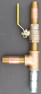 An assembly of nipples, tee and ball valve permit peroxide to easily be added to a water heater