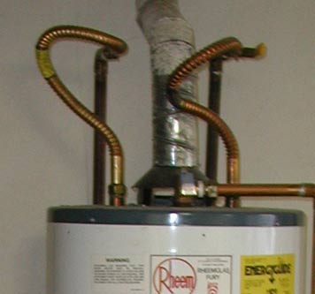 A top-plumbed water heater
